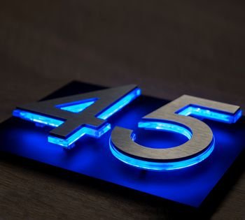 View the stunning Luna LED plaque with floating NLUX™ LED numbers on matt finish acrylic. The Luna LED illuminated number plaque is a highly versatile LED sign, suitable for inside or outside installation in a range of sizes making it perfect for Homes, Apartments, Businesses, Hotels and more.  