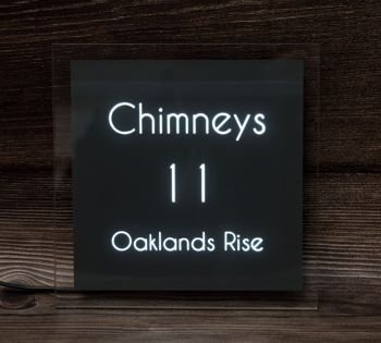 The Sirius LED illuminated house sign with its modern sleek design seamlessly integrates with your home