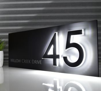 The Valencia is a sophisticated and rather stunning house sign embellished with NLUX™ LED floating numbers mounted on a luxurious matt finish acrylic. Available in a wide range of sizes.